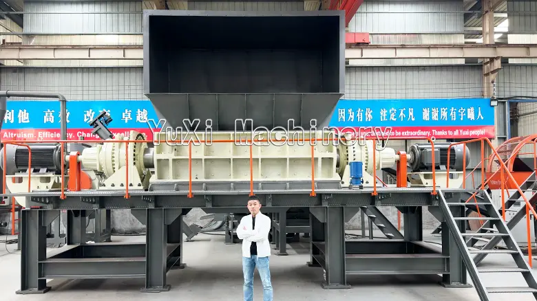 Full view of the twin shaft scrap metal shredder installed in the manufacturing facility